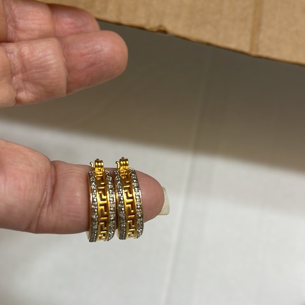 Gold and silver hoops.